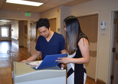 Nursing staffs looking at the book